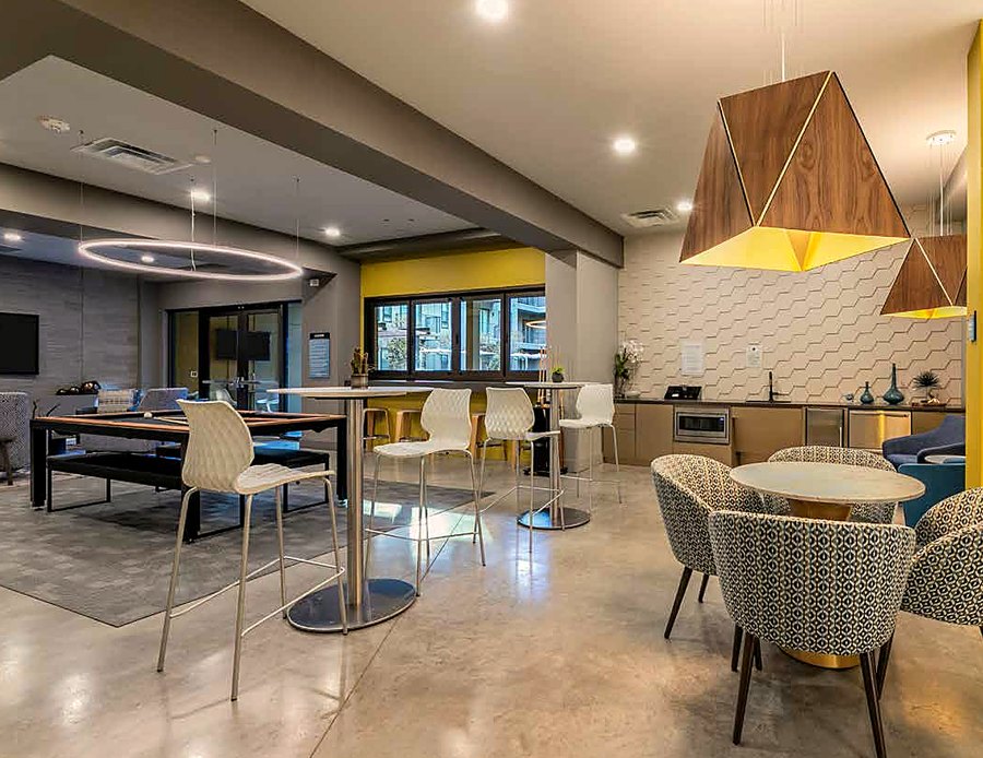 Coworking lounge with billiards table at The Cooper apartments